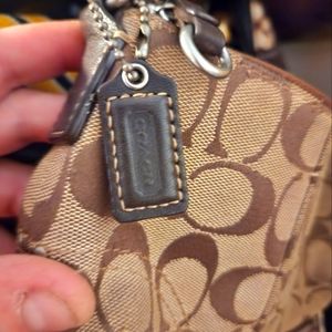 Coach . Tan and brown.